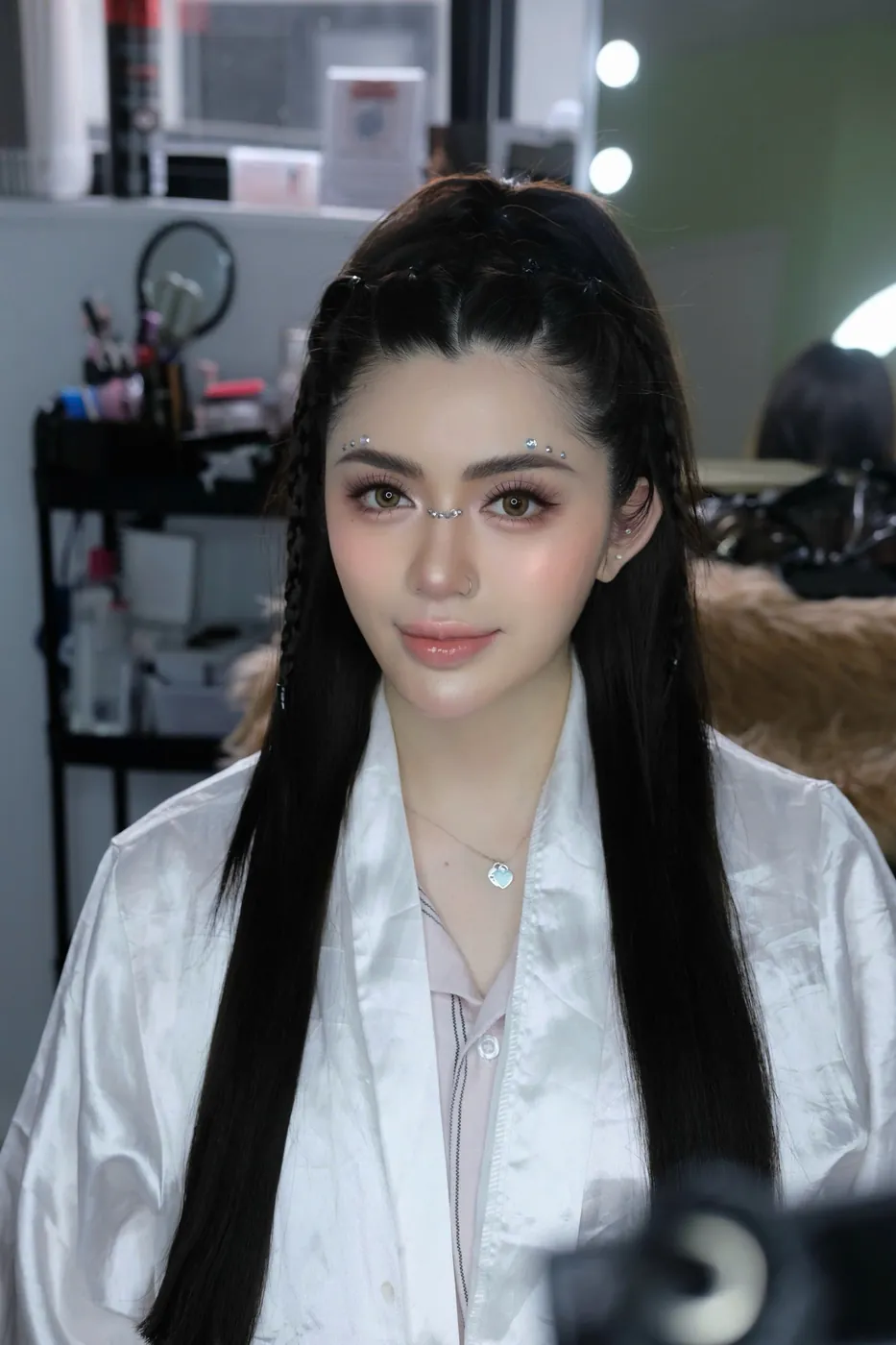 Fresh, glowing makeup with long straight hair